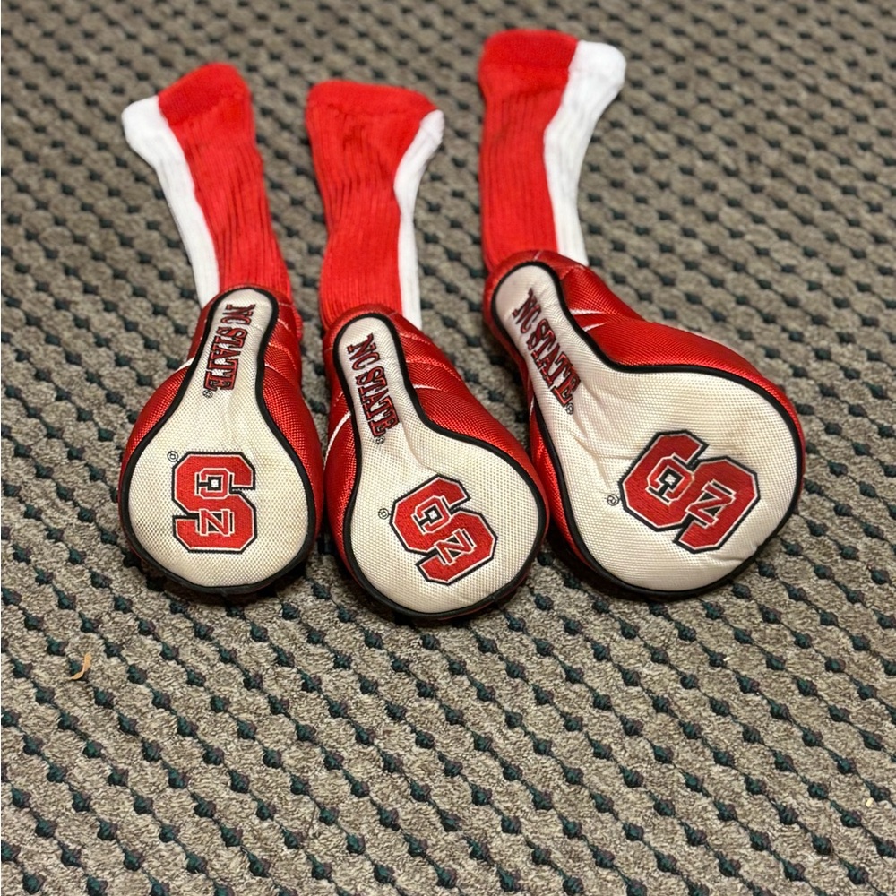golf club head covers in excellent condition.